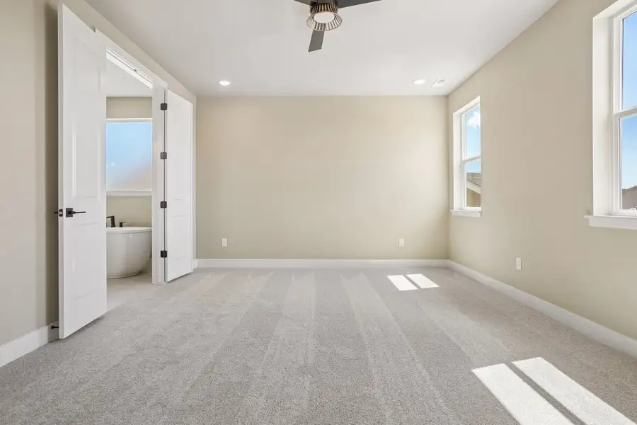 Spacious, unfurnished interior of a new home in Jackson Creek North, Monument (Image 48).