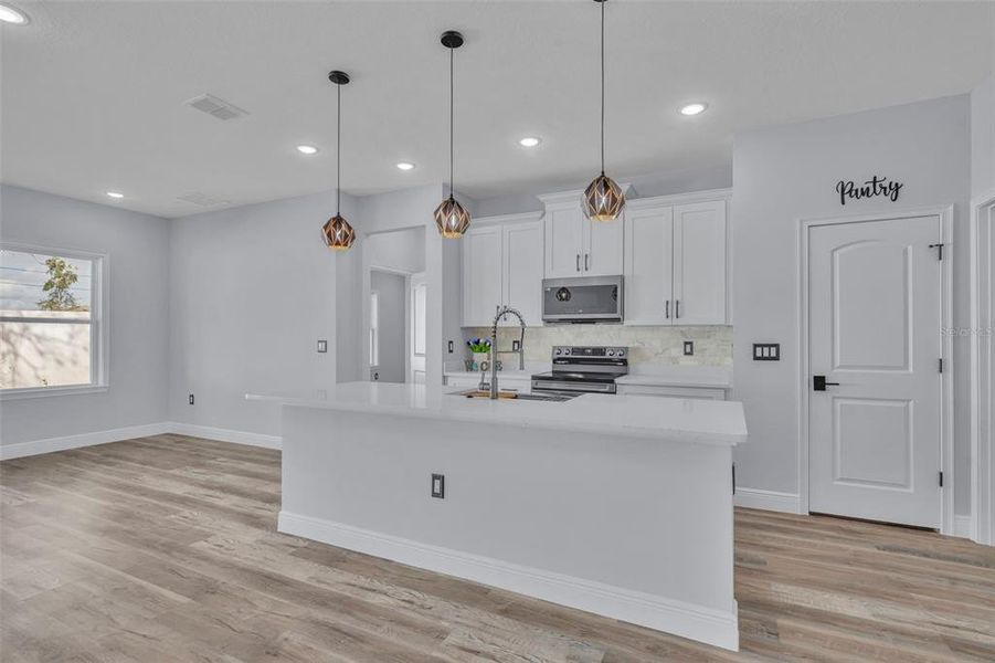 Furnished interior view inside a new home in , Poinciana (Image 11).