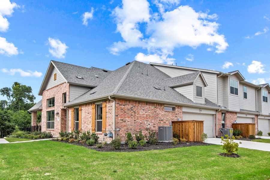 Front exterior of a new home in Cottonwood Creek, Rowlett, TX, highlighting curb appeal (Image 25). Front exterior of a new home in Cottonwood Creek, Rowlett, TX, highlighting curb appeal (Image 25).
