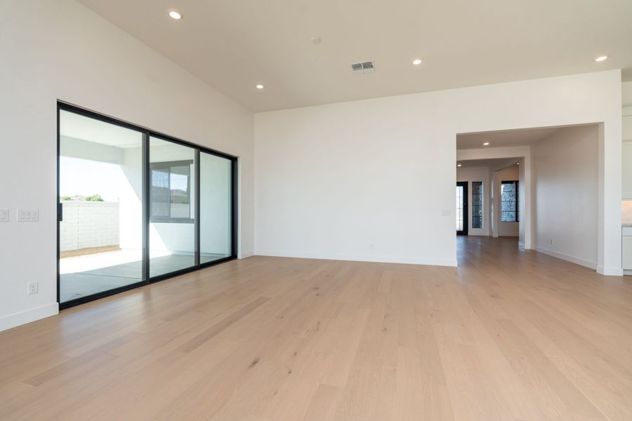 Representative unfurnished interior of a home built from the Aurora Plan 9001 by Tri Pointe Homes in Emberly, Gilbert (Image 25). Representative unfurnished interior of a home built from the Aurora Plan 9001 by Tri Pointe Homes in Emberly, Gilbert (Image 25).