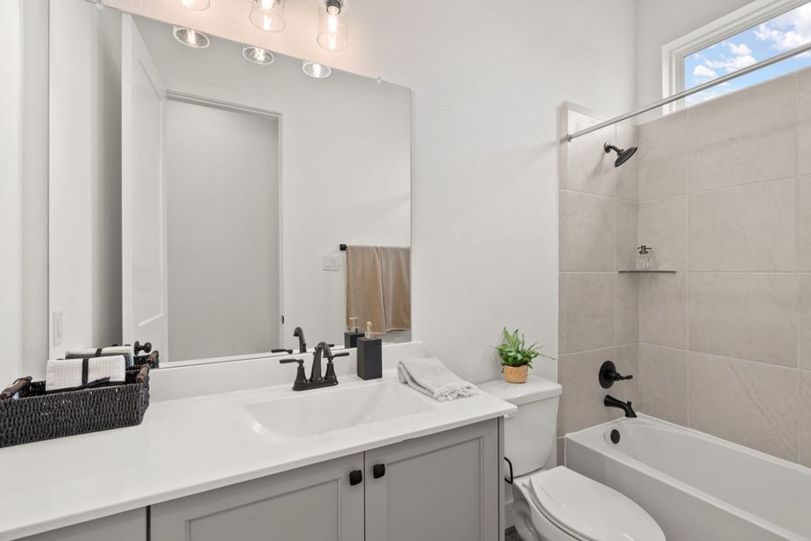 Representative furnished interior of a home built from the Viola by Chesmar Homes in Mulberry Farms, Santa Fe (Image 7).