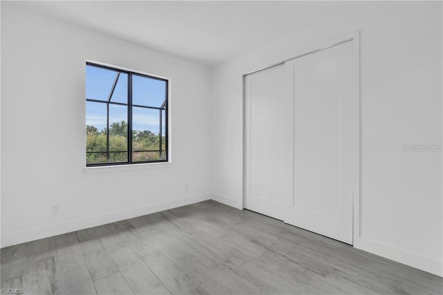 Spacious, unfurnished interior of a new home in , Port Charlotte (Image 13).