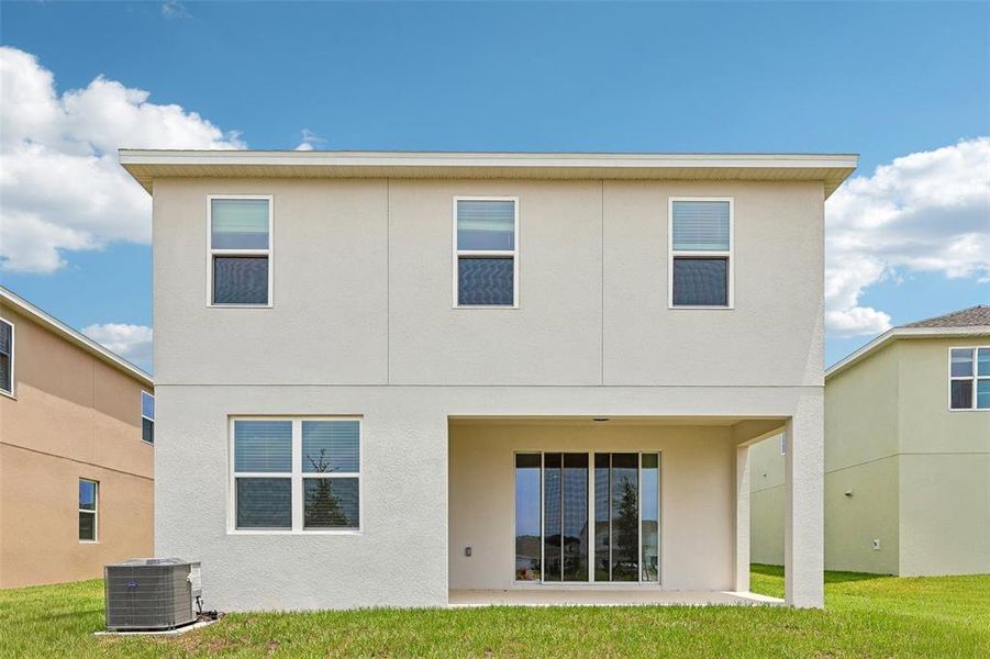 Exterior details and patio area of a home in Trinity Lakes, Groveland (Image 20).