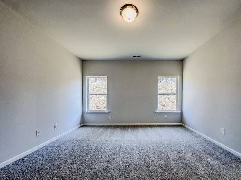 Representative unfurnished interior of a home built from the The Hampton by Smith Douglas Homes in Enclave at Willis, Willis (Image 23).