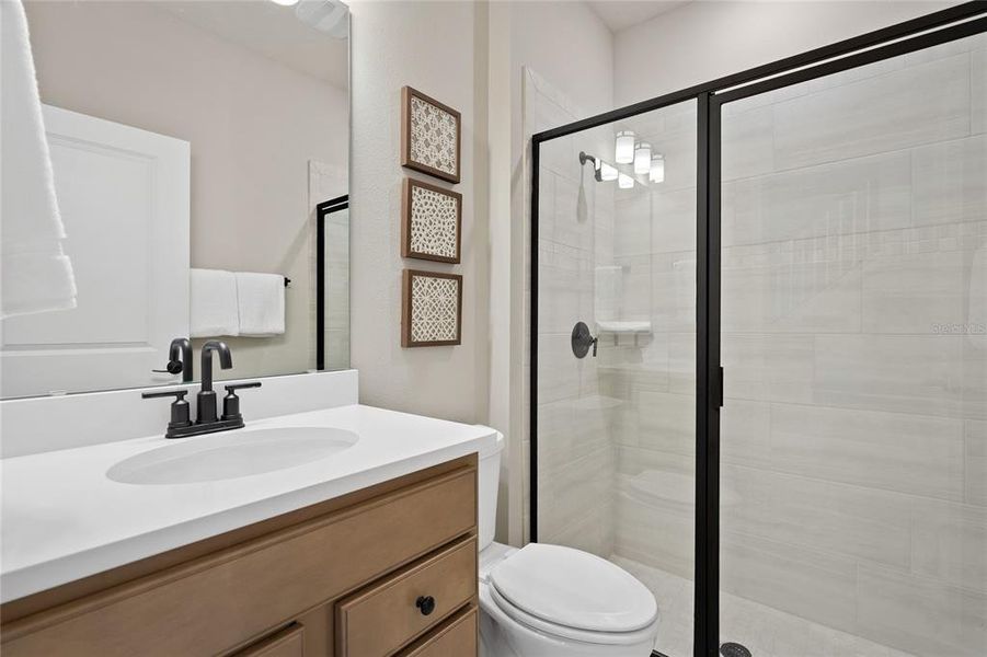 Furnished interior view inside a new home in Parkside Trails, Clermont (Image 21).