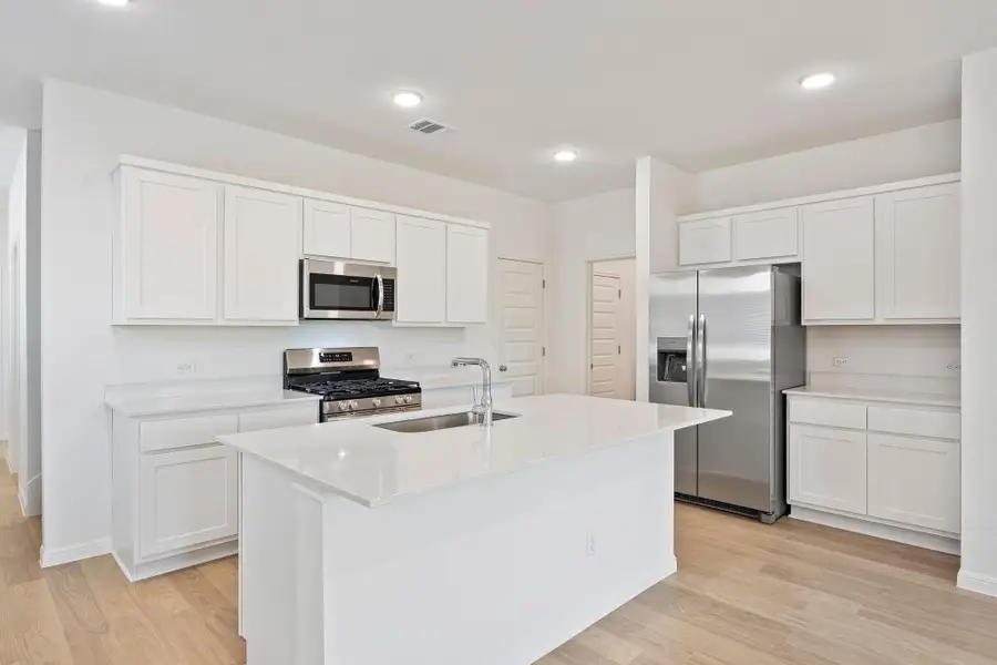 Furnished interior view inside a new home in Trinity Ranch, Elgin (Image 9).