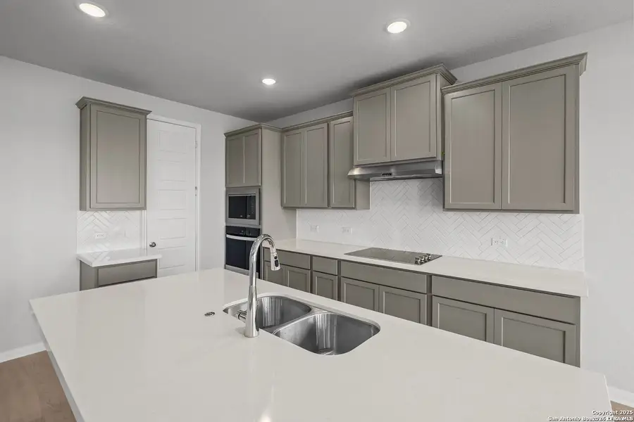 Furnished interior view inside a new home in Megan's Landing, Castroville (Image 11).