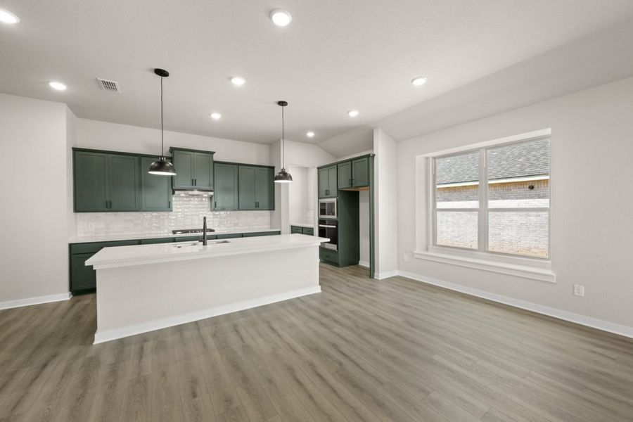 Representative furnished interior of a home built from the Sunterra Rowan 2104 by Brohn Homes in Sunterra, Katy (Image 7).