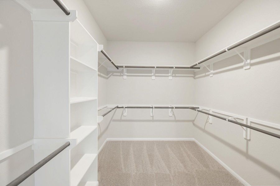 Large walk-in closet Large walk-in closet