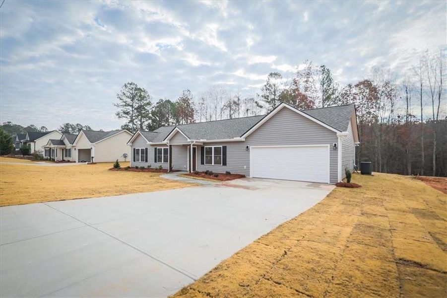 Front exterior of a new home in , Rockmart, GA, highlighting curb appeal (Image 2). Front exterior of a new home in , Rockmart, GA, highlighting curb appeal (Image 2).