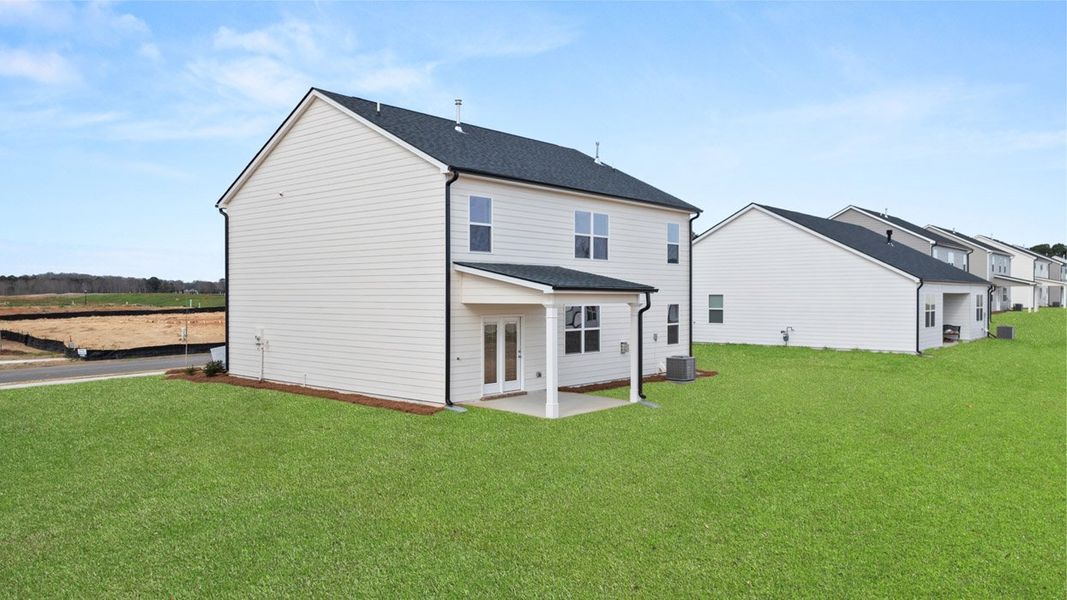Front exterior of a new home in Estates at Deer Hollow, Grovetown, GA, highlighting curb appeal (Image 23).