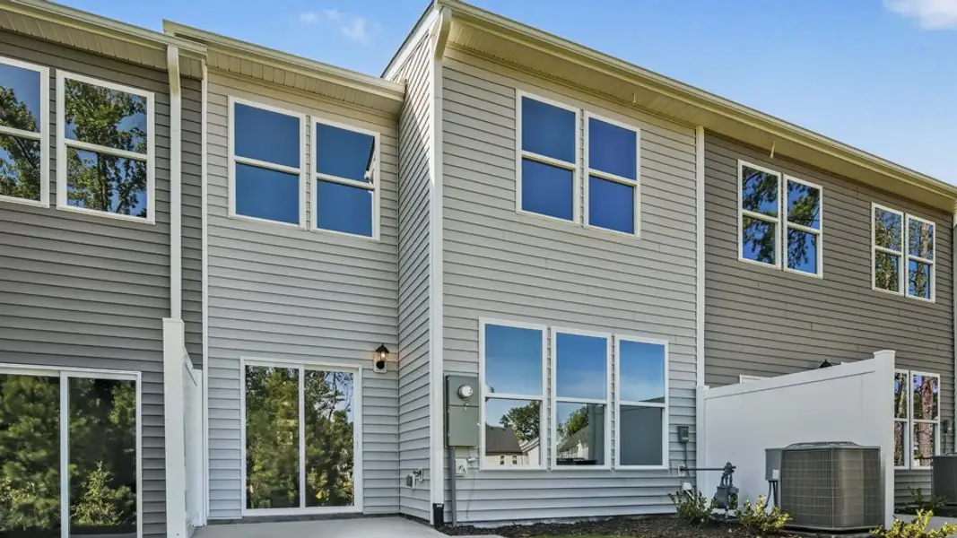 Exterior details and patio area of a home in Chapel Townes, Raleigh (Image 28).