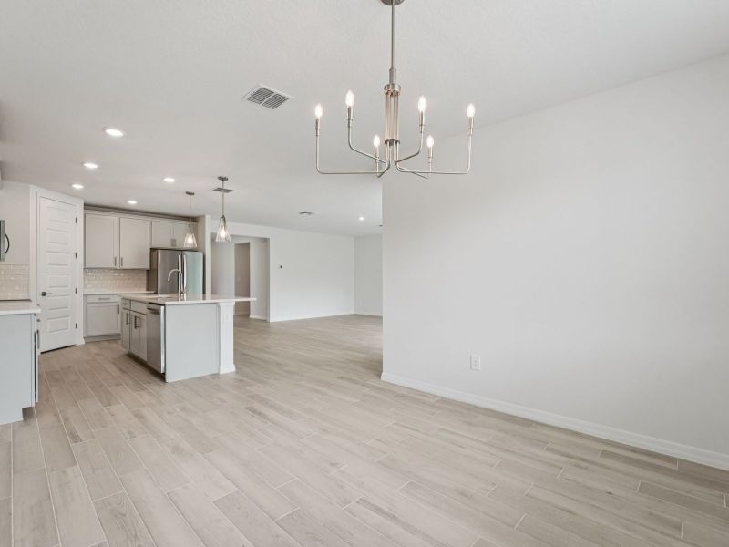 Spacious, unfurnished interior of a new home in The Grove at Stuart Crossing - Signature Series, Bartow (Image 11).