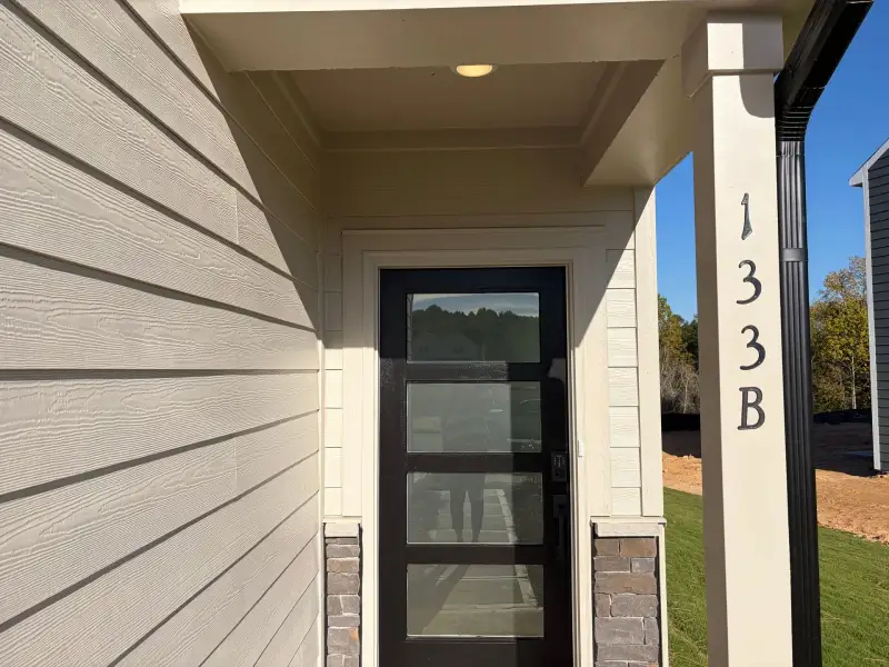 Exterior details and patio area of a home in Harris Place, Mooresville (Image 3).