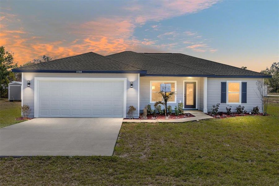 Front exterior of a new home in , Dunnellon, FL, highlighting curb appeal (Image 16).
