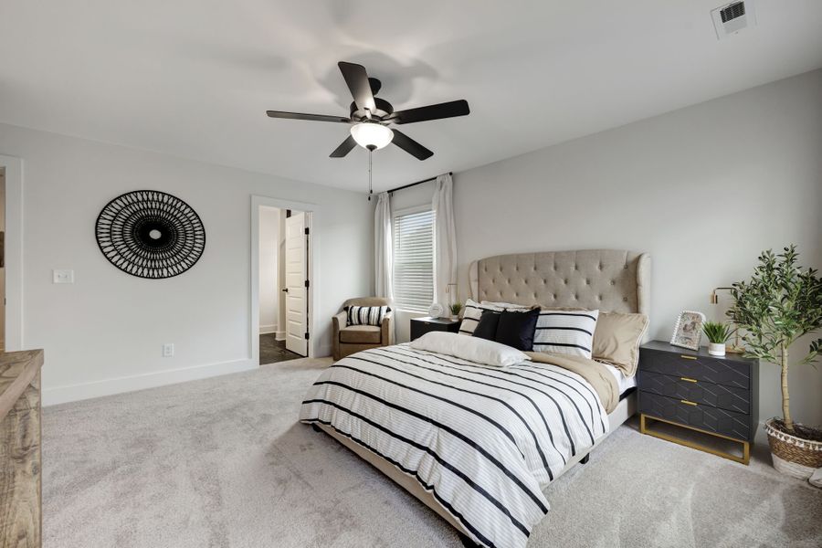 Relaxing Owner’s Suite in The Henley Model Home