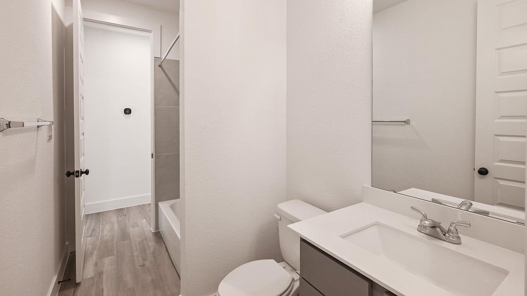 Furnished interior view inside a new home in Crosswinds 50', Kyle (Image 7). Furnished interior view inside a new home in Crosswinds 50', Kyle (Image 7).