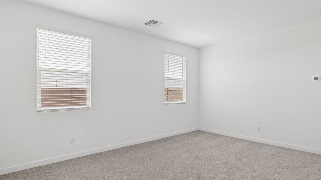Spacious, unfurnished interior of a new home in Radiance at Superstition Vistas, Apache Junction (Image 24).