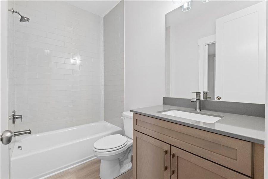 Furnished interior view inside a new home in Devin's Shire - A Kennesaw Tradition, Kennesaw (Image 8).