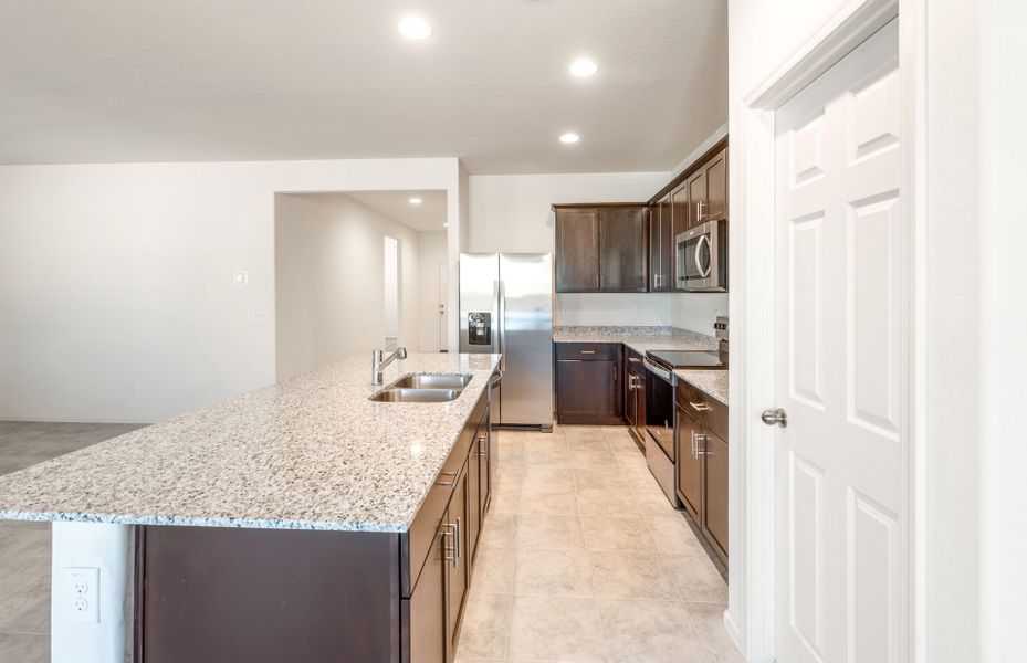 Furnished interior view inside a new home in El Rancho Santa Rosa, Maricopa (Image 9).