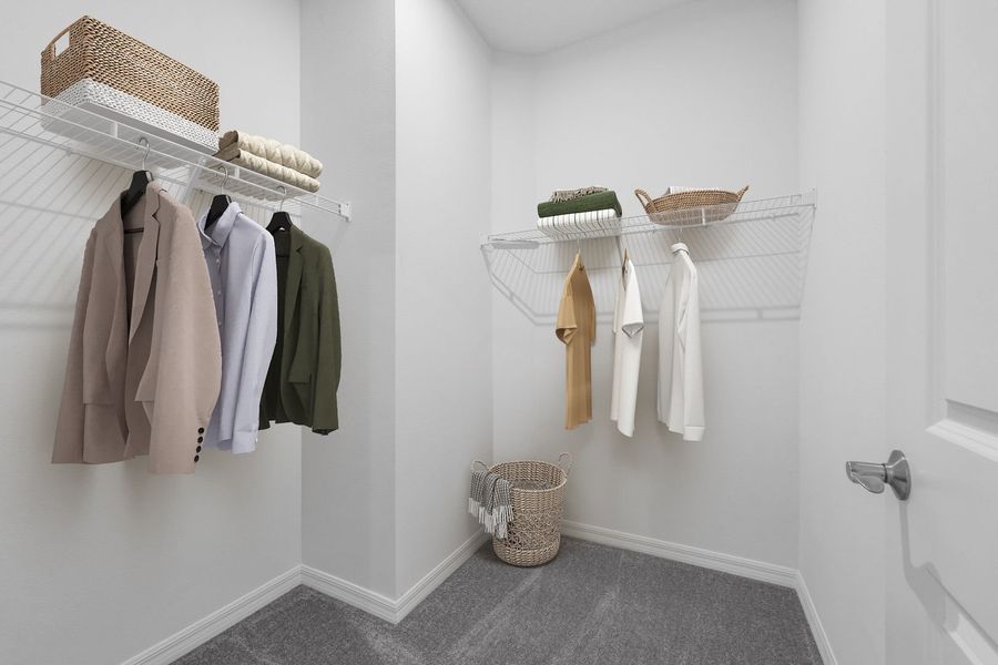 Walk-in Closet Attached to the Primary Bedroom Walk-in Closet Attached to the Primary Bedroom