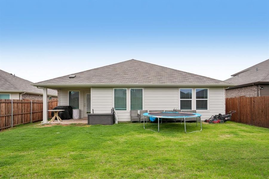 Exterior details and patio area of a home in Frontier Pointe, Princeton (Image 4).