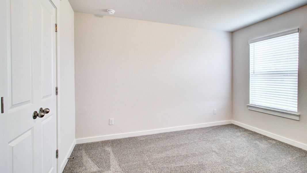 Representative furnished interior of a home built from the Majestic by Brightland Homes in Sunterra, Katy (Image 12).