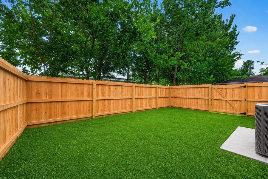 Exterior details and patio area of a home in , Houston (Image 3).