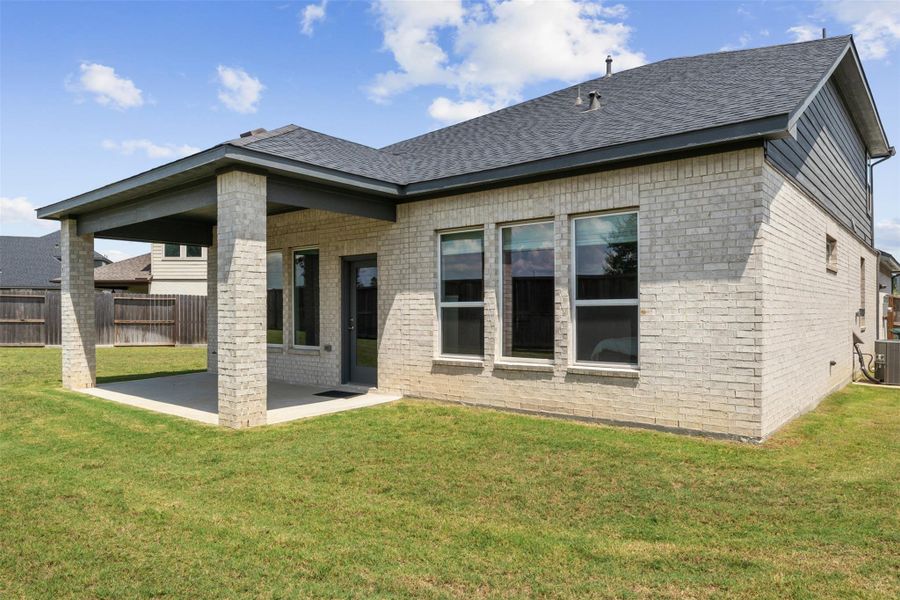 Exterior details and patio area of a home in Raburn Reserve 50s, Tomball (Image 4). Exterior details and patio area of a home in Raburn Reserve 50s, Tomball (Image 4).