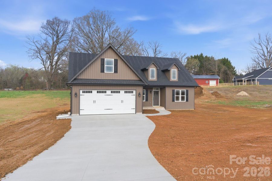 Front exterior of a new home in , Winston-Salem, NC, highlighting curb appeal (Image 24).