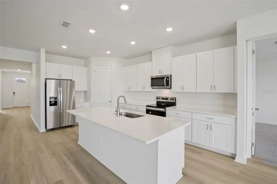 Furnished interior view inside a new home in Coasterra - Reserve Series, Palmetto (Image 6). Furnished interior view inside a new home in Coasterra - Reserve Series, Palmetto (Image 6).