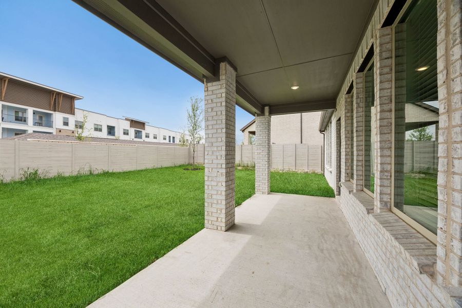 Exterior details and patio area of a home in Painted Tree Woodland West, McKinney (Image 3).