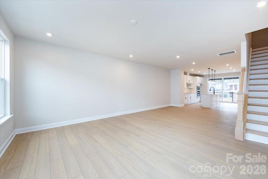 Open Concept Living and Second Floor Oak Box Stairs