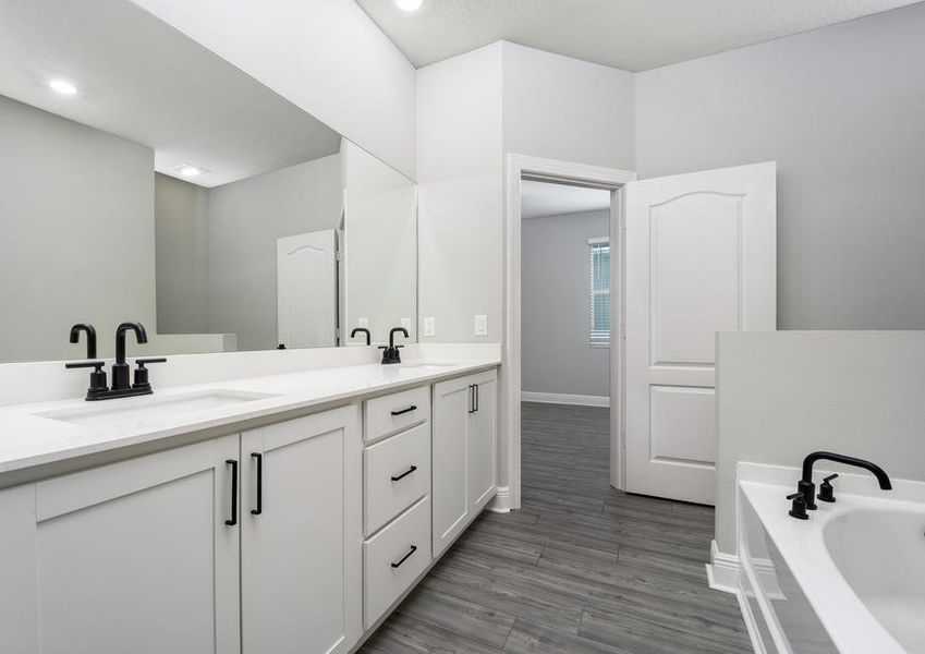 A separate tub in the master bathroom