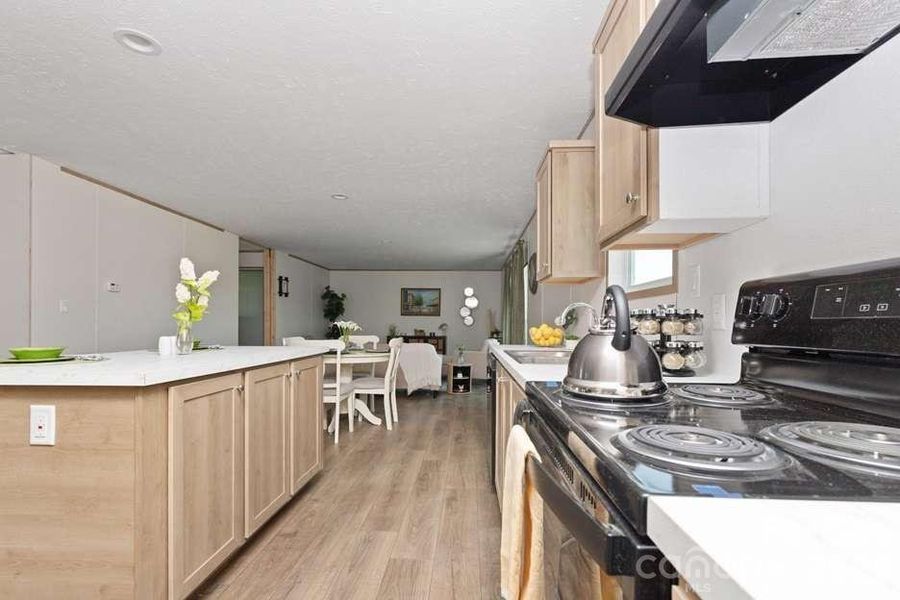 Furnished interior view inside a new home in , Newton (Image 10).