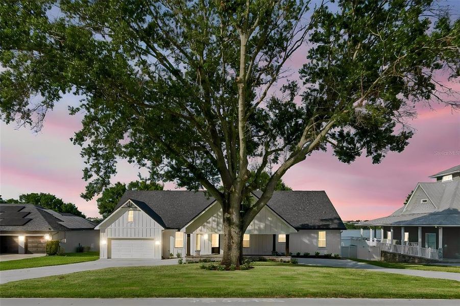 Front exterior of a new home in , Auburndale, FL, highlighting curb appeal (Image 1). Front exterior of a new home in , Auburndale, FL, highlighting curb appeal (Image 1).