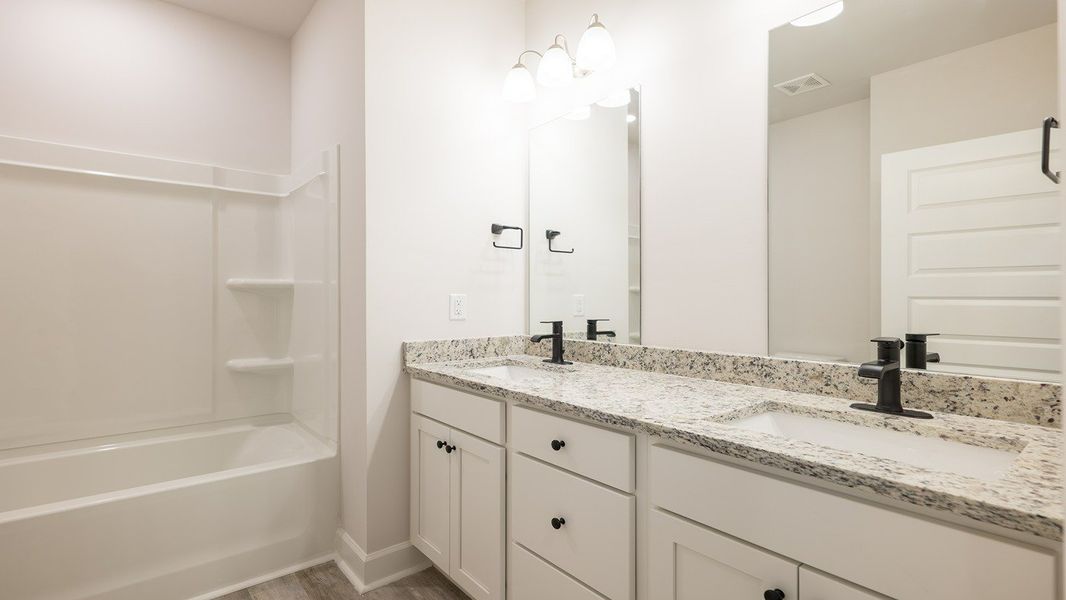 Representative furnished interior of a home built from the The Victoria by D.R. Horton in Meadows at Rehwinkel, Crawfordville (Image 24).