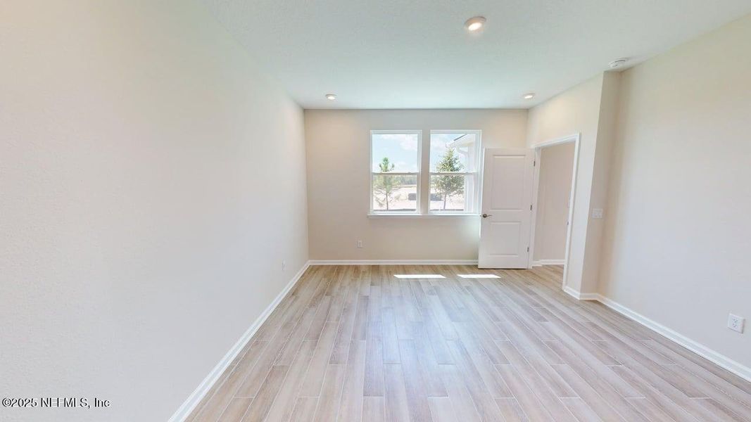 Spacious, unfurnished interior of a new home in RiverTown - WaterSong, St. Johns (Image 14).