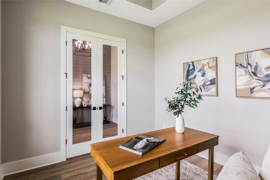 Another view of the home office with double doors Another view of the home office with double doors