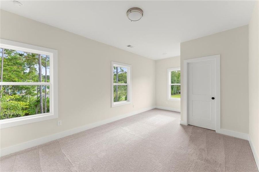 Spacious, unfurnished interior of a new home in Hillgrove Preserve, Powder Springs (Image 43).