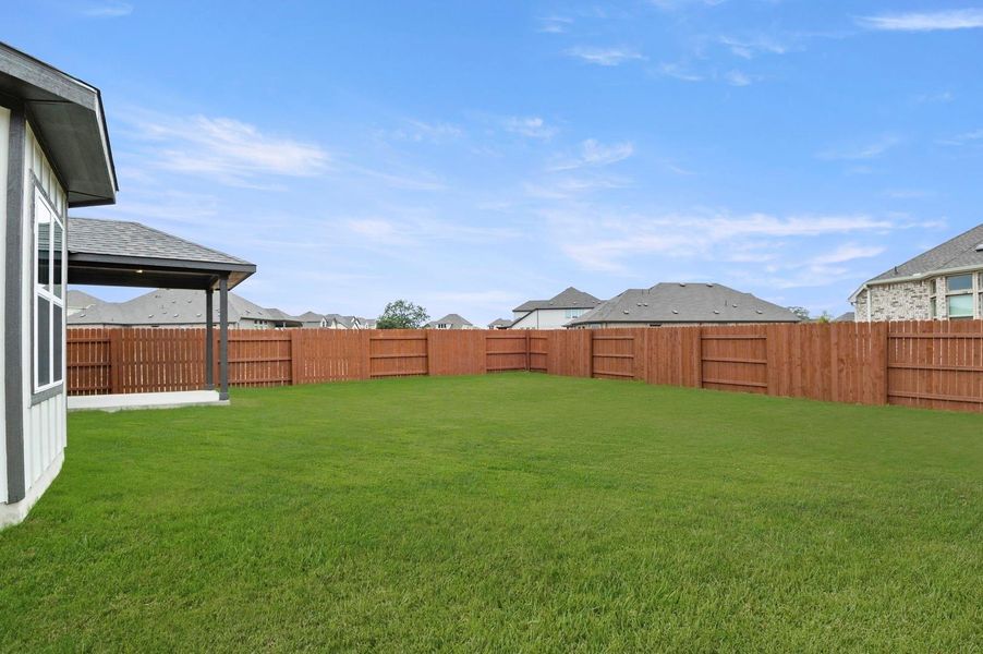 Exterior details and patio area of a home in Oaks at San Gabriel, Georgetown (Image 3).