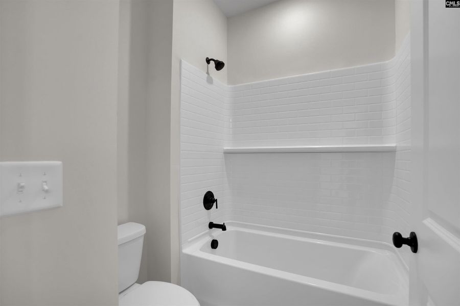 Furnished interior view inside a new home in Rolling Hills, Prosperity (Image 7).