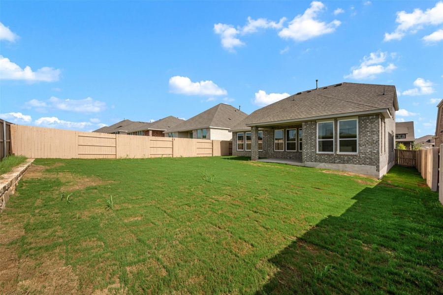 Exterior details and patio area of a home in The Colony, Bastrop (Image 18). Exterior details and patio area of a home in The Colony, Bastrop (Image 18).