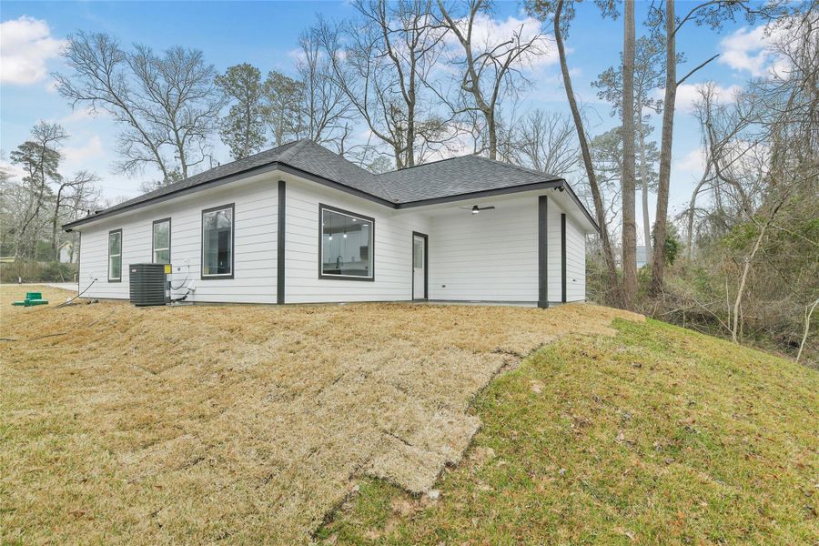 Exterior details and patio area of a home in , Willis (Image 26).