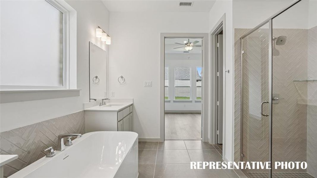 Whether it's soaking your cares away or taking a long, luxurious shower, you'll love everything this over the top bath has to offer!  REPRESENTATIVE PHOTO