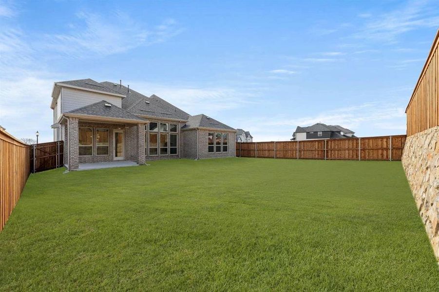 Exterior details and patio area of a home in Wellspring Estates, Celina (Image 3). Exterior details and patio area of a home in Wellspring Estates, Celina (Image 3).