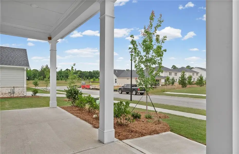 Exterior details and patio area of a home in Overland, Locust Grove (Image 3). Exterior details and patio area of a home in Overland, Locust Grove (Image 3).