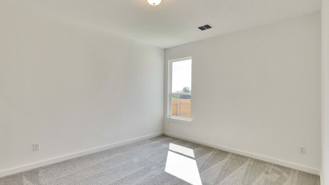 Furnished interior view inside a new home in Creeks Crossing, Elgin (Image 28).