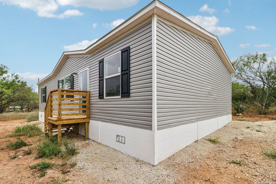Exterior details and patio area of a home in , Devine (Image 20). Exterior details and patio area of a home in , Devine (Image 20).