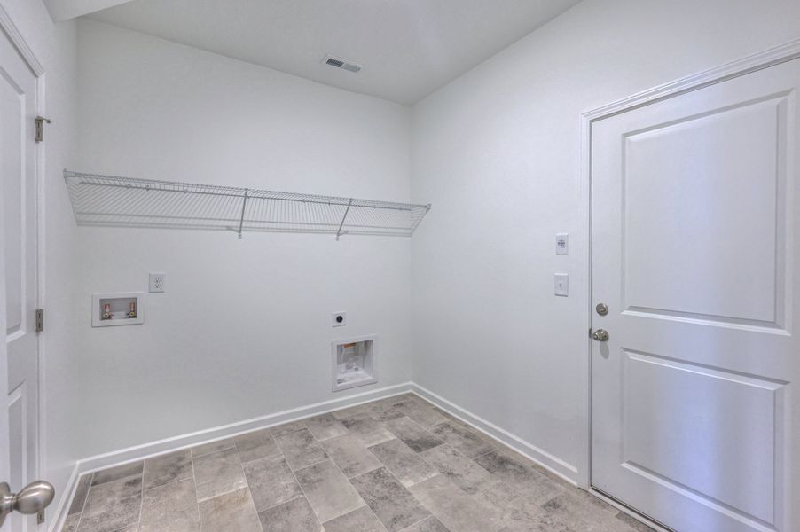 *Photo of example home. Selections & Finishes May Vary.